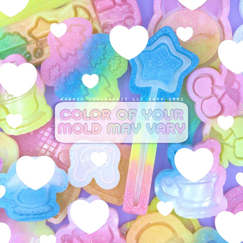May include: A collection of colorful, glittery resin molds in various shapes, including stars, flowers, and animals. The text "COLOR OF YOUR MOLD MAY VARY" is displayed on a rectangular label. The background is a soft purple with white heart shapes.