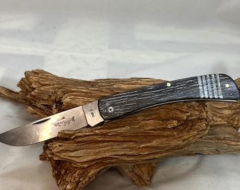 Navaja Custom Case XX Sod Buster: roble de pantano, incrustaciones de abulón y grabado en salmón