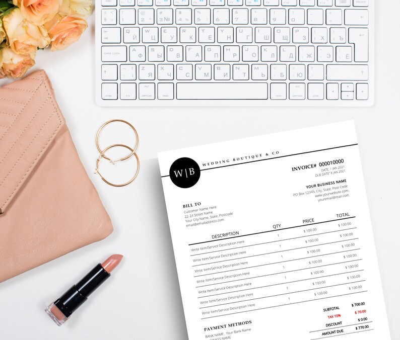 May include: A flat lay featuring a white keyboard, a pink clutch, gold hoop earrings, and a tube of lipstick. A wedding boutique invoice is on the right. The invoice has the text "WEDDING BOUTIQUE & CO" and "INVOICE #000010000".