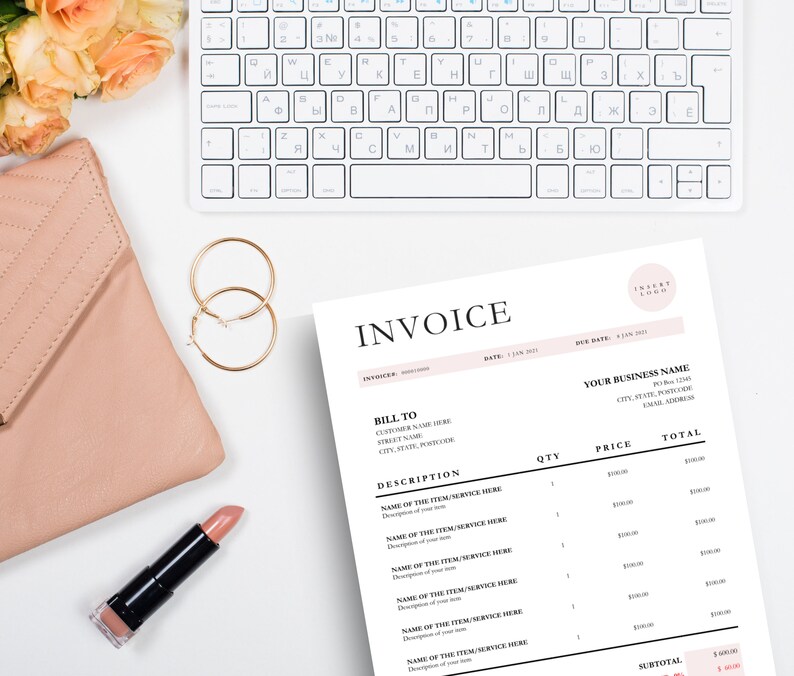 Invoice template laying next to nude purse, gold earrings and lipstick.