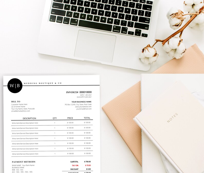 May include: A minimalist invoice from Wedding Boutique & Co. is displayed on a white surface, alongside a laptop, notebooks, and decorative cotton stems. The invoice includes fields for item descriptions, quantities, and prices. The design is clean and modern.