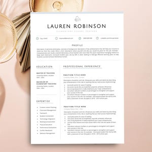 May include: A white resume template for an elementary school teacher featuring the name Lauren Robinson at the top, with sections for profile, education, professional experience, and expertise, all printed in black text on a clean white background.