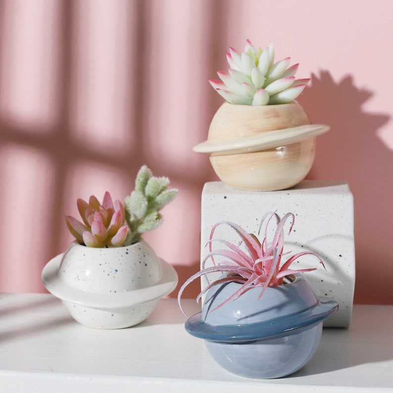 ceramic planet succulent pots with pink background