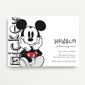 May include: Black and white illustration of Mickey Mouse sitting with a red circle on his shorts. The text "Hudson is turning one" is written below the image. The invitation includes the date, time, address, and RSVP information.