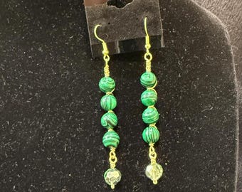 Green malachite beads hand wrapped with gold stacked dangly earrings