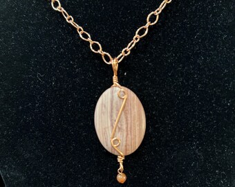 Bright copper triple spiral on Sandstone Jasper necklace