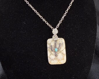 Cactus charm on fossil coral necklace