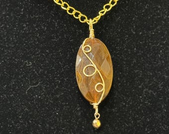 Facetted brown agate hand wrapped by gold wire loops dual sided necklace