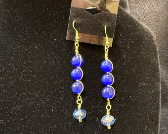 Blue bead hand wrapped with gold wire loops dangly earrings