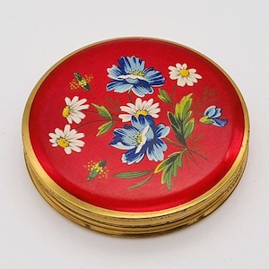 Taschenspiegel in Rot und Gold mit Blumenschmuck