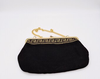 black and gold purse