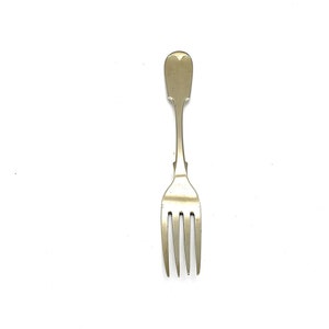 May include: A silver fork with a simple, rounded handle and four tines.