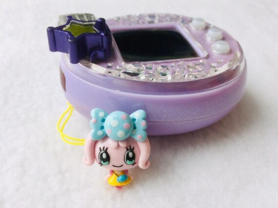 Candy Pakupaku inspired Tamagotchi charm 3d very detailed and realistic