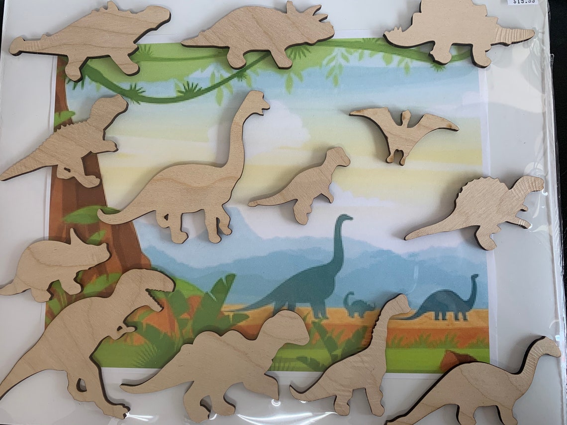 painted wooden dinosaur cutouts