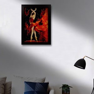 May include: A framed painting of a woman in a red dress with a flowing skirt, dancing against a black background with orange and yellow accents. The painting is in a black frame.