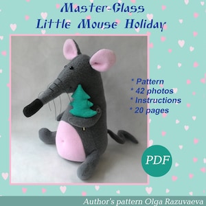 May include: A gray and pink plush mouse holding a green Christmas tree. The mouse is sitting on a white background. The text "Master-Glass Little Mouse Holiday" is at the top of the image. The text "* Pattern * 42 photos * Instructions * 20 pages" is on the right side of the image. The text "PDF" is in a circle at the bottom right of the image. The text "Author's pattern Olga Razuvaeva" is at the bottom of the image.