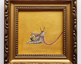 Original tiny oil painting of a walking snail in a vintage frame. Ready to display. Cute small wall art for cozy homes