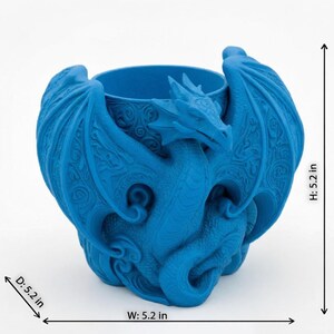 Blue Mythical Dragon Desk Organizer:  Displaying its dimensions.
- Width: 5.2 inches
- Height: 5.1 inches
- Depth: 5.9 inches.