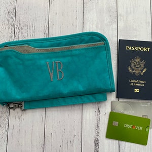 Cartera para pasaporte de viaje RFID personalizada y organizador de documentos/estuche con cremallera y correa de muñeca extraíble