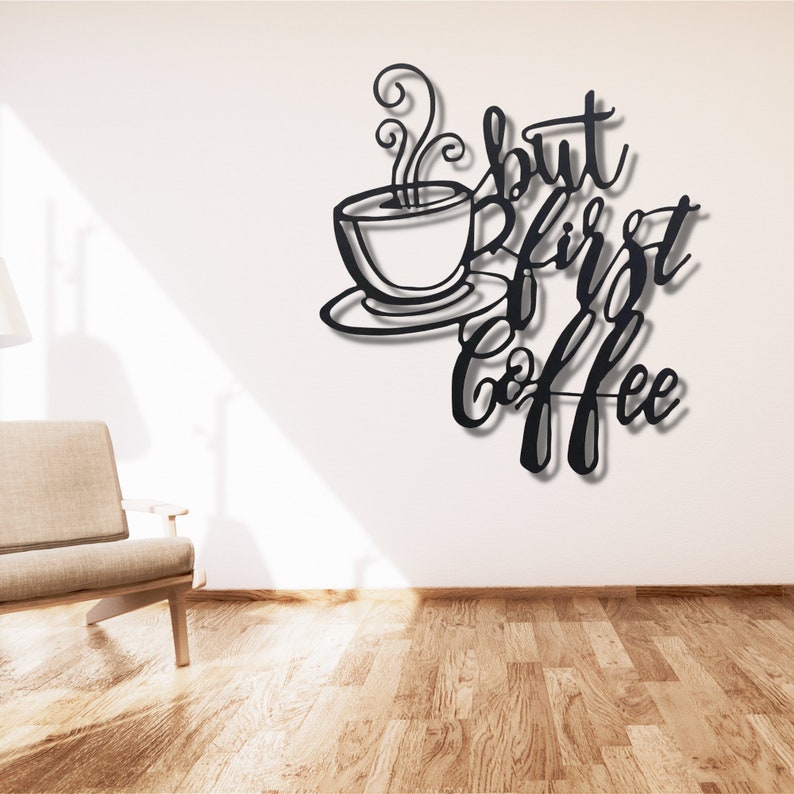 May include: Black metal wall art with a coffee cup and the text "But first, coffee".