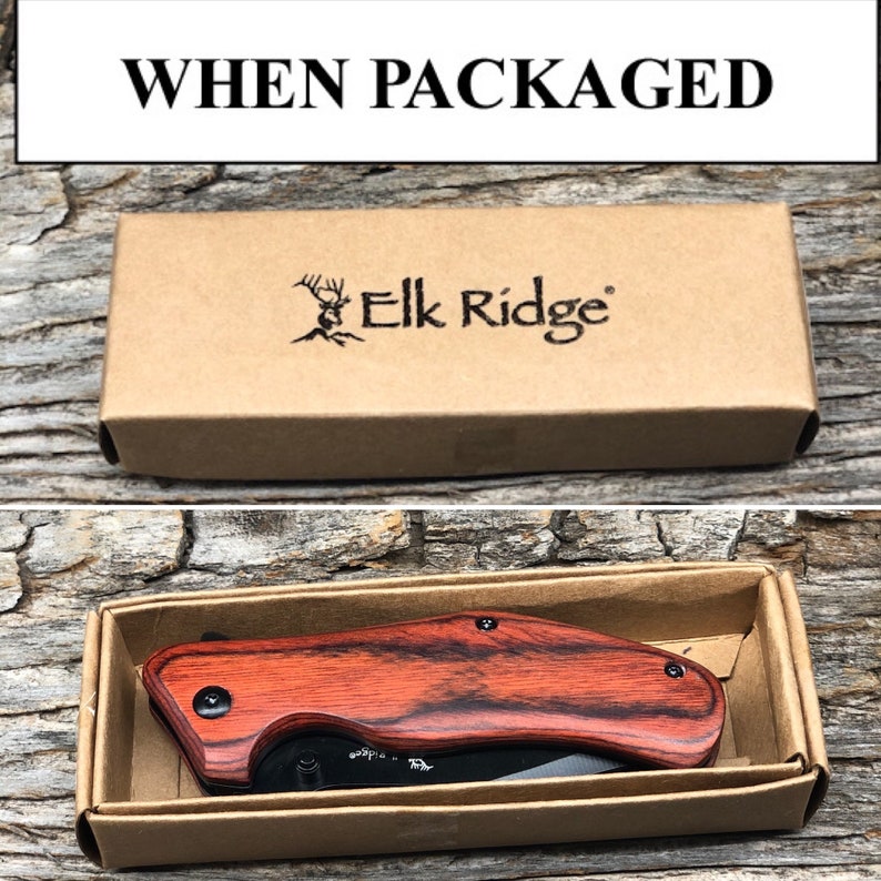 May include: A brown cardboard box with the text "Elk Ridge" printed on it. The box contains a red and black folding knife with a wooden handle.