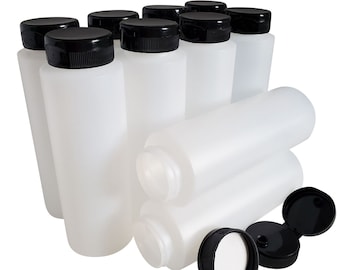 May include: Ten clear plastic bottles with black screw-on lids. The bottles are stacked and arranged in a group.