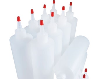 May include: A set of ten clear plastic squeeze bottles with red caps. The bottles are all the same size and shape, and they are arranged in a pyramid shape.