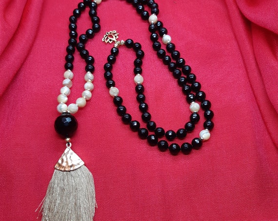 Black tourmaline faceted 108 beads Japa Mala and golden mother of pearl, tassel