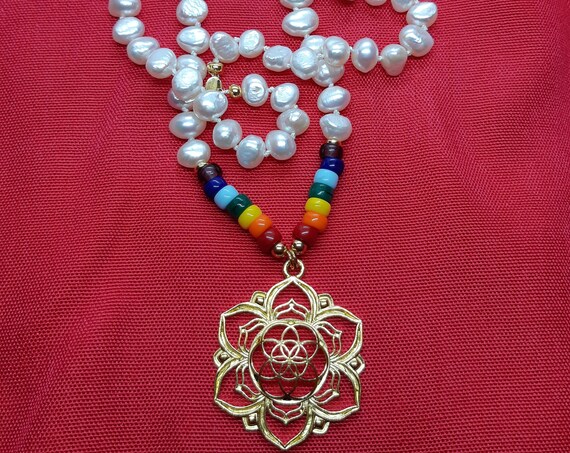 Natural pearl necklace, handmade with Czech glass beads with the colors of 7 chakras and symbol of the seed of life