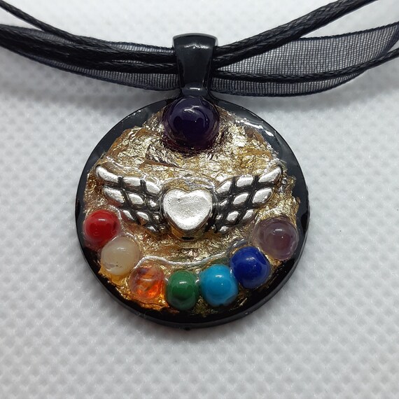 Orgone pendant with 7 chakras and angel wings