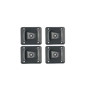 May include: Four black plastic square-shaped mounting brackets with a single hole in the center of each.