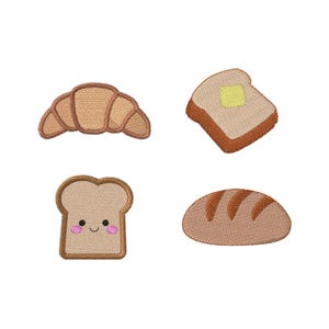 May include: Four embroidered patches featuring bakery items: a golden-brown croissant, a slice of toast with a yellow butter square, a smiling piece of bread with pink cheeks, and an oval-shaped loaf of bread with three dark brown diagonal stripes.
