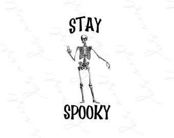 May include: A black and white illustration of a skeleton giving a peace sign. The words "STAY SPOOKY" are written in bold, black letters above and below the skeleton. The background is white with a subtle pattern.