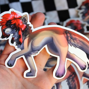 May include: A sticker of a cartoon wolf with red and black fur, a white chest, and a long, bushy tail. The wolf is walking with its head turned to the side.