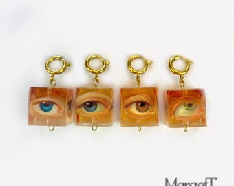 Collezione di 4 ciondoli a forma di occhio