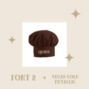 May include: Brown chef hat with the name "QUINN" embroidered in gold metallic thread. The hat is shown against a light brown background.