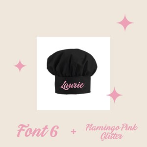 May include: Black chef hat with the name "Laurie" embroidered in pink glitter font.