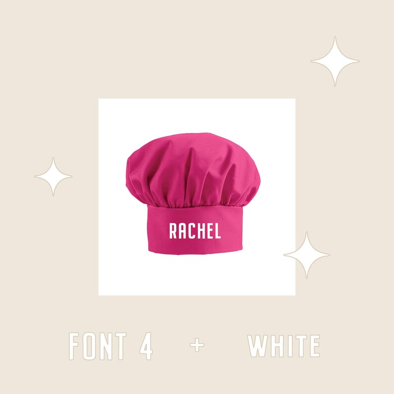 May include: Pink chef hat with the name Rachel in white text on the front. The hat is on a white background.