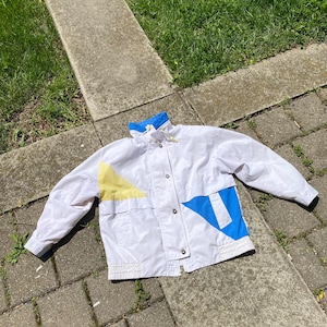 vintage Windbreaker with geometric design fits XL