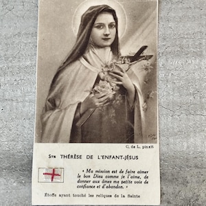 Carte relique de sainte Thérèse de Lisieux avec etoffe ayant touché aux reliques de la sainte