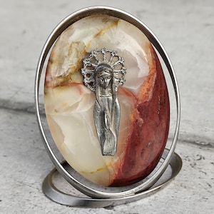 virgin mary statue on onyx