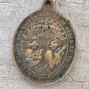 Antique bronze religious medal pendant to the glory of the holy hearts of Jesus and Mary