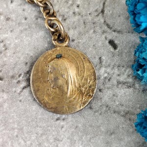 gold plated Virgin mary medal