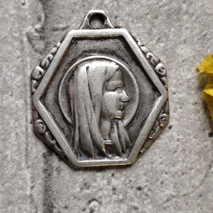 Virgin Mary art déco medal