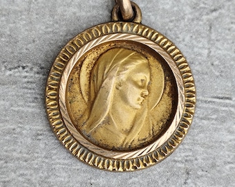 Gold-plated Virgin Mary medal
