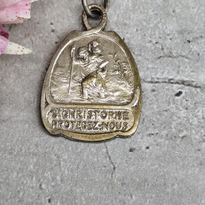gammal religiös medalj av Sankt Kristoffer, resenärernas skyddshelgon