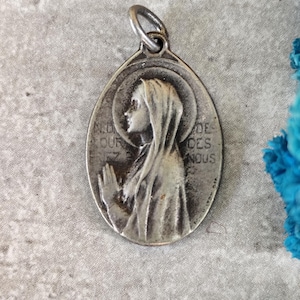 virgin mary medal
