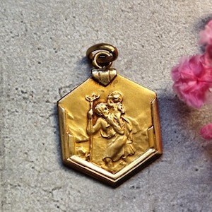 Antique gold-plated religious medal of Saint Christopher
