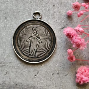 Virgin mary silver medal