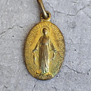 Virgin mary medal